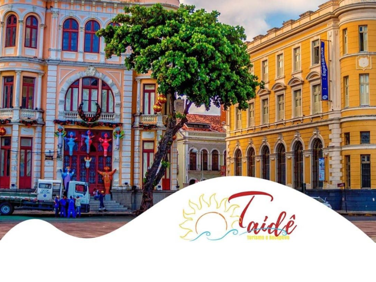 Foto centro de Recife com logo Taidê Turismo